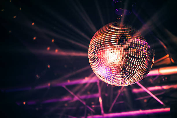 disco ball with bright rays, night party - purple pattern abstract backdrop imagens e fotografias de stock