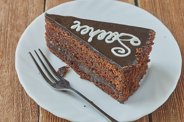 istock Delicious cake Sacher on a wooden background 635851848