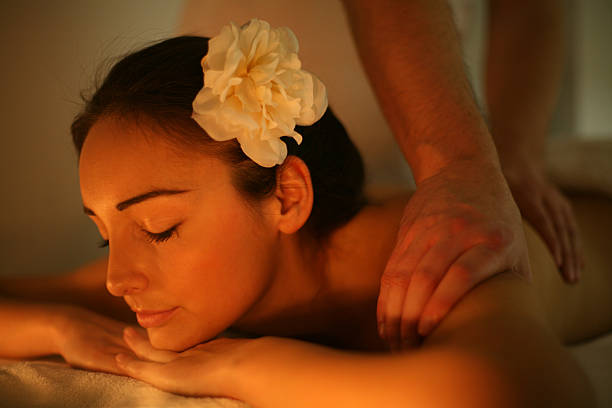 istock Woman enjoying a massage treatment. 635852292