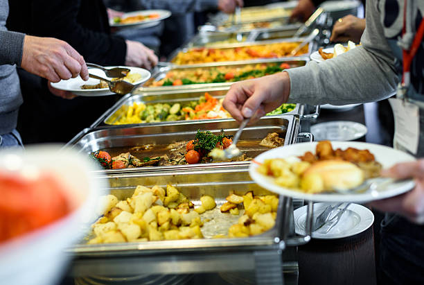 Cuisine Culinary Buffet Dinner Catering Dining Food Celebration Cuisine Culinary Buffet Dinner Catering Dining Food Celebration Party Concept. Group of people in all you can eat catering buffet food indoor in luxury restaurant with meat and vegetables. buffet stock pictures, royalty-free photos & images