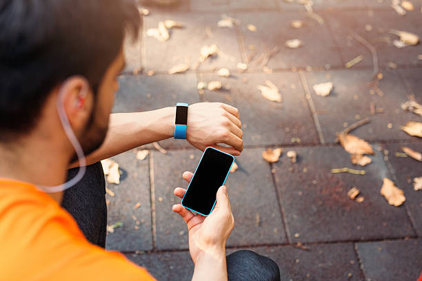 istock Mobile phone connected to a smart watch 635863006