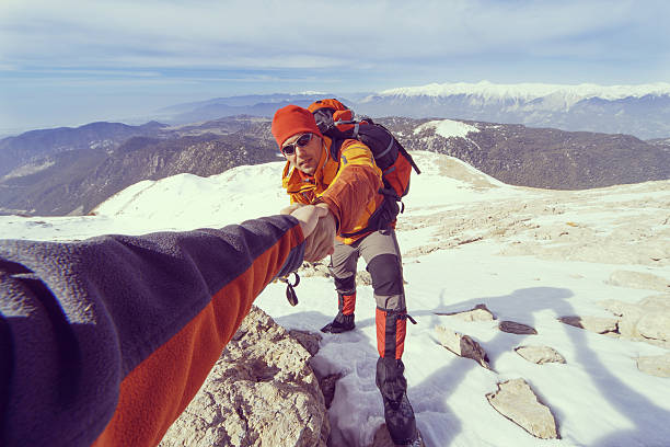 istock Winter hiking in the mountains with a backpack. 635865072