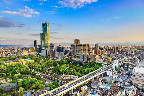 istock Osaka Japan Cityscape 635865112