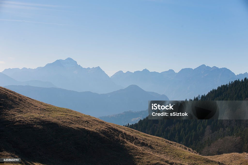 Beautiful mountains nature It is beautiful view of mountains and with shinny blue sky. It is nice example of timberline, meadow, deciduous forest, coniferous forest and rock mountains. Adventure Stock Photo