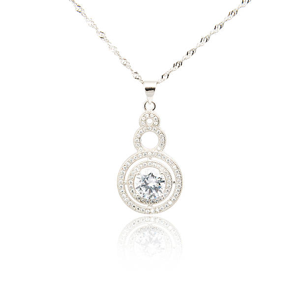 istock Silver fashion pendant isolated on white 635865666