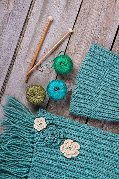 istock Knitted handmade scarf and hat. 635865930