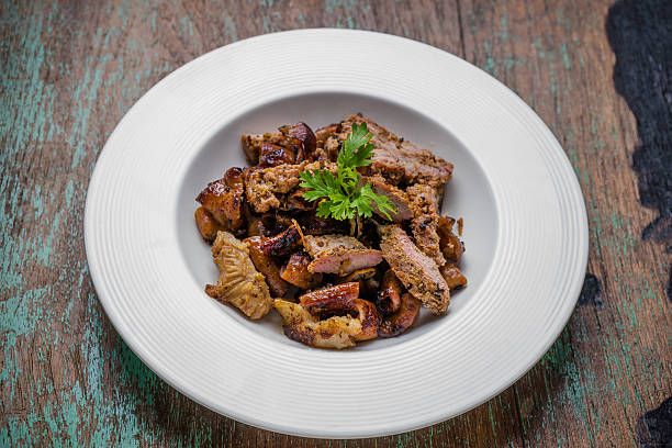 istock Grill pork on wooden table.  (Thai style food) 635866692