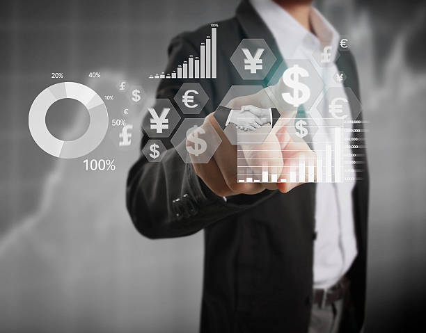 istock financial symbols coming from hand 635869942