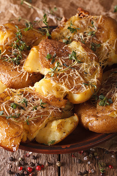 istock Australian new crash hot potatoes with thyme and cheese macro 635872098
