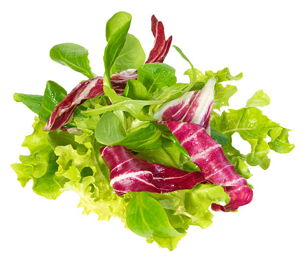 Fresh salad mix(+clipping path) Salad rucola,frisee,radicchio and lamb's lettuce,isolated on white with clipping path. spring mix lettuce leaves stock pictures, royalty-free photos & images