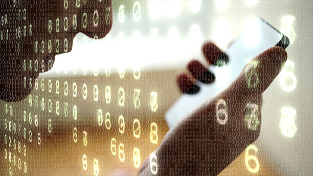 istock Man talking into a phone overlaid with glowing numbers. 635872452