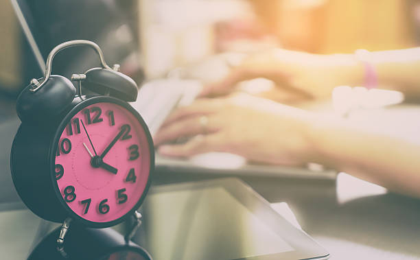 istock Office worker is almost finish working in the afternoon hour. 635872474