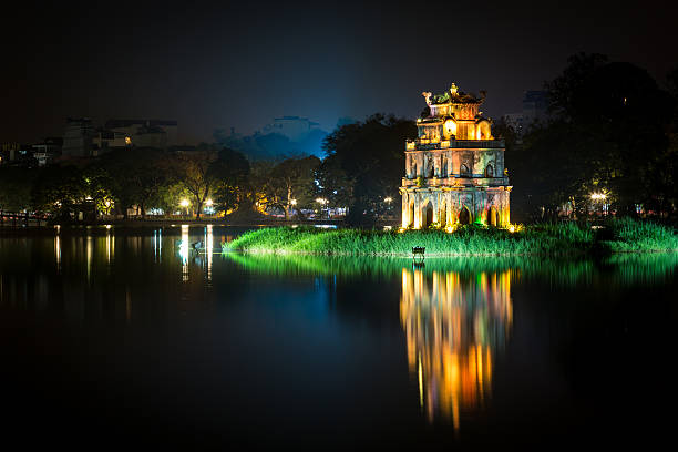 istock Tortoise Tower and Reflection at Night, Hanoi, Vietnam 635874440