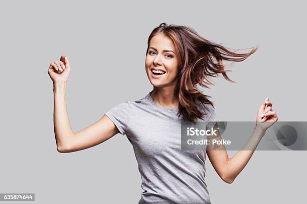 Beautiful Emotional Woman Having Fun Stock Photo - Download Image Now - Women, One Woman Only, Arms Outstretched