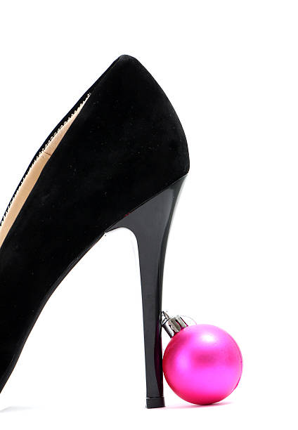istock Black high heel isolated on white background, 635875296
