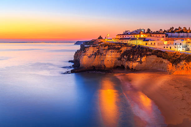 Carvoeiro in Algarve region, Portugal, Europe A panorama of Carvoeiro at the dusk in Algarve region, Portugal, Europe albufeira photos stock pictures, royalty-free photos & images