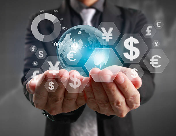 istock financial symbols coming from hand 635875822