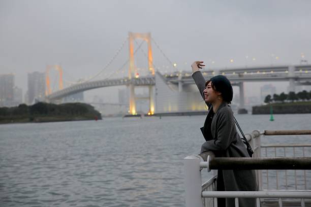 istock Young lady saying goodbye at bay 635876394