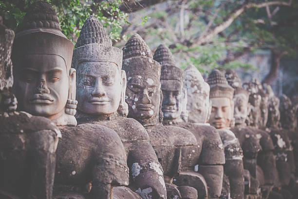 istock Statues at South gate Angkor Wat, Cambodia 635876836