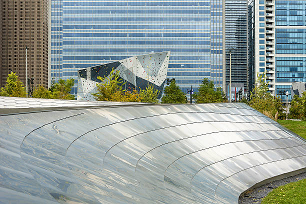 Chicago Public pedestrian walkway Chicago, IL, USA, october 27, 2016: Public BP walkway in Millenium park on April 10, 2015 in Chicago, IL. Millenium Park is the second most popular public attraction in the city of Chicago. frank gehry building stock pictures, royalty-free photos & images