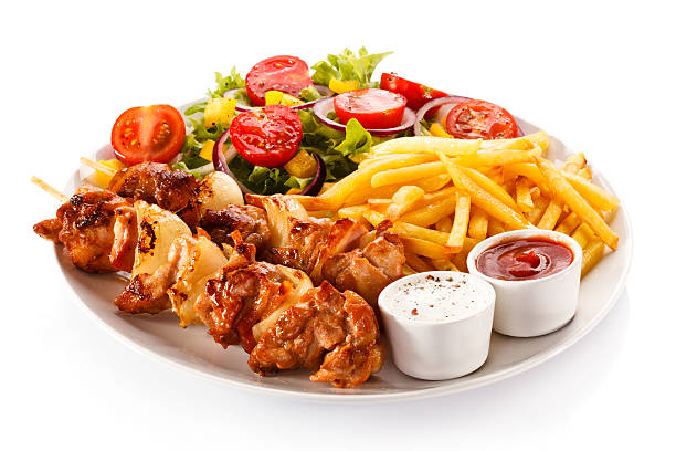 Kebab - grilled meat and vegetables Grilled meat and vegetables  shish kebab stock pictures, royalty-free photos & images