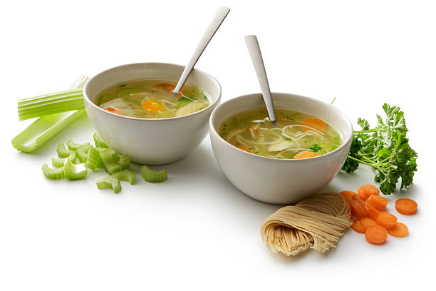 istock Soups: Chicken Soup and Ingredients Isolated on White Background 635878634