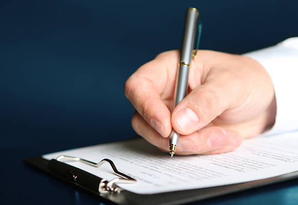 istock signing finance contract 635882940