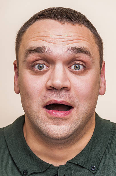 istock Surprised, shocked, emotional, big eyes man with open mouth. 635883078