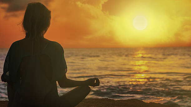 istock Yoga on the beach 635888254