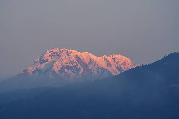 istock Mountain peak with morning light on white background 635889686