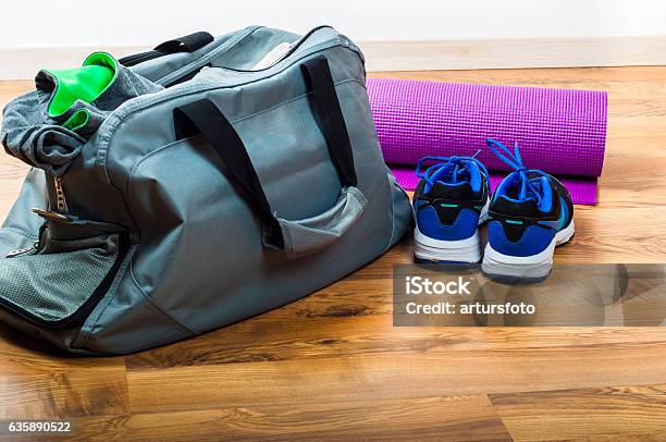 Sport Bag On The Wooden Floor Stock Photo - Download Image Now - Bag, Exercising, Group Of Objects