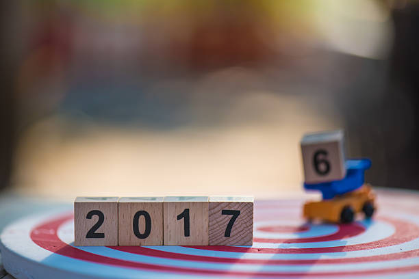 Wood block 2017 on red Dartboards, New year concept