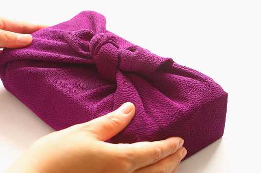 Handing wrapping cloth Furoshiki parcel, Japanese hospitality