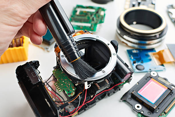 istock Repair broken digital SLR camera in service 635893586