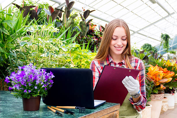istock Working in the greenhouse 635893900