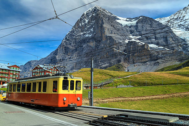 istock Retro tourist train and Eiger North face, Bernese Oberland, Switzerland 635894242