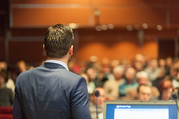 istock Public speaker giving talk at Business Event. 635894454