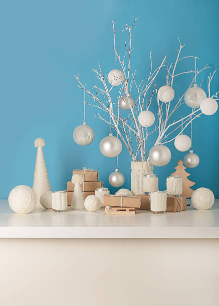 istock Vase in white knitted cover with white branches and Christmas 635894944