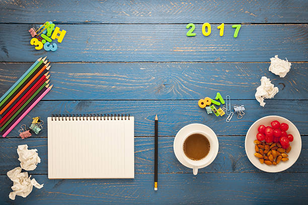 istock Office supplies on desk blue wood table 635895796