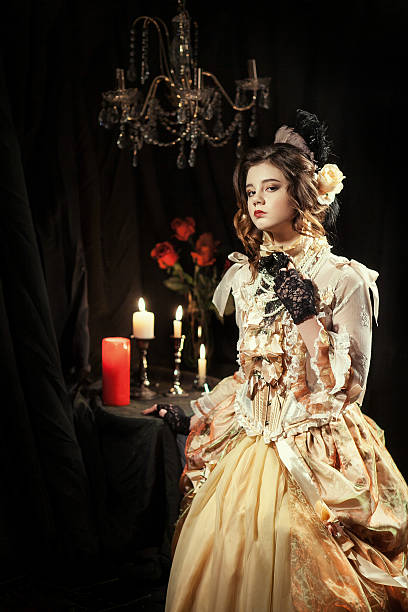 istock girl dressed in the style of Rococo 635899120