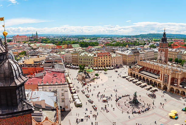 Aerial view on the central square and Sukiennice in Krakow. Aerial view on the central square and Sukiennice in Krakow. Market Square from the tower of the church of St. Mary. Poland. Cloth Hall. krakow stock pictures, royalty-free photos & images