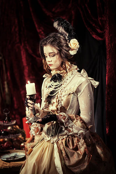 istock girl dressed in the style of Rococo 635899394
