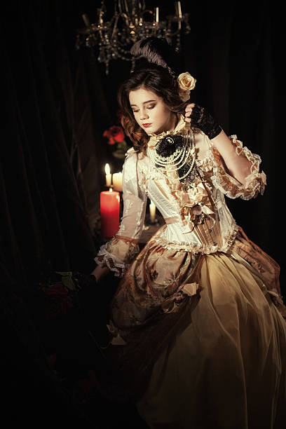 istock girl dressed in the style of Rococo 635901052