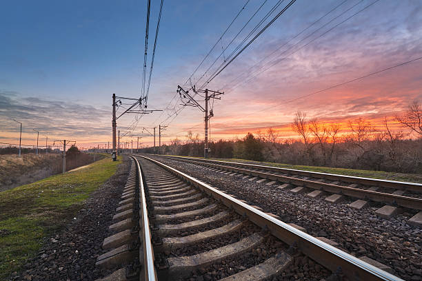istock Railway station against beautiful sky at sunset. Railroad 635903120