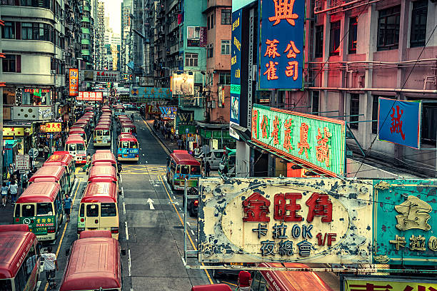 istock Hong Kong Street Scene, Mongkok District with busses 635903242