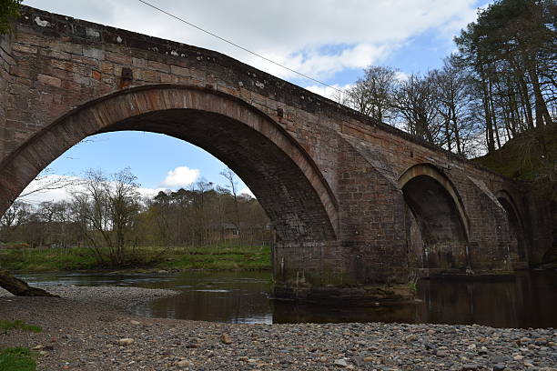 istock Arched bridge over the River Ayr at Stair 635904824