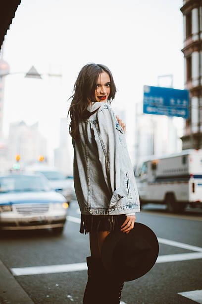 istock Young woman in denim jacket 635911260