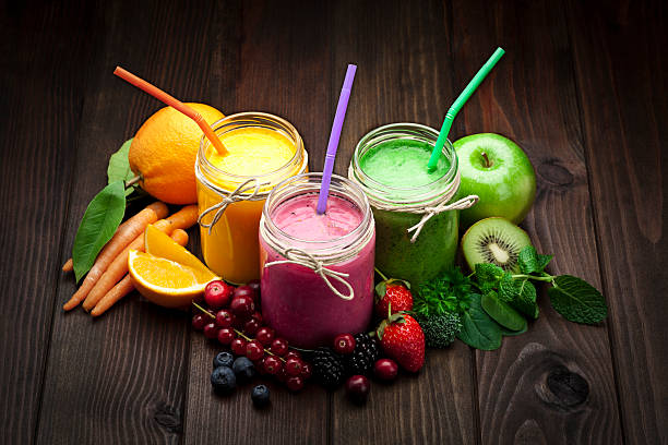 frullati di frutta miscelati - fresh juice foto e immagini stock