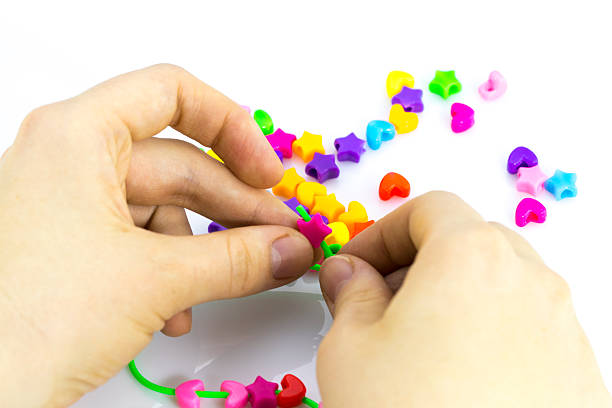 istock Making of handmade jewellery.multi colored beads 635917338