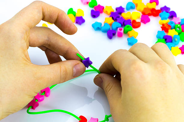 istock Making of handmade jewellery.multi colored beads 635917412
